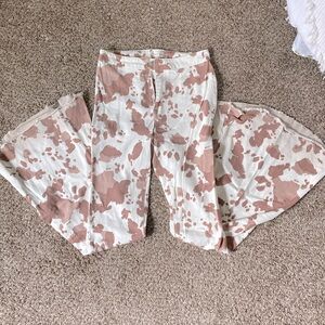 Altar’d State Cow-print Flare Pants